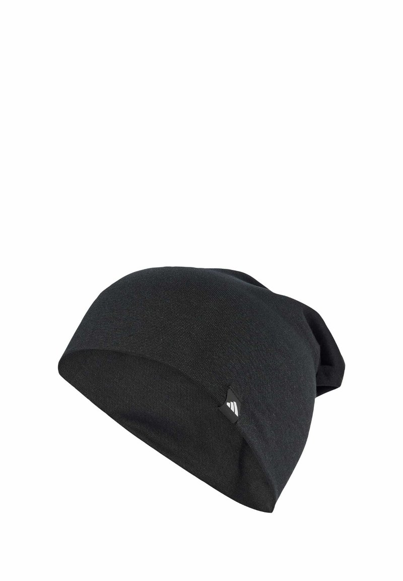 Black beanie hat made of a soft textile material. Features a slouchy design and a small logo tag on the side. Smooth texture.