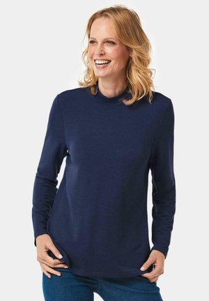 Navyblaues Langarmoberteil mit hohem Kragen, aus weichem Stoff. Verfügt über eine lockere Passform mit Seitennähten und einem abgerundeten Saum.