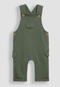 Grønne bomuldsdungarees med justerbare stropper, træknapper og forlommer. Har sidelommer og opsmøgede kanter.