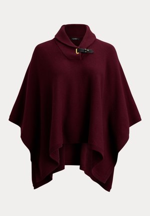 Poncho tricotat burgundy cu guler înalt, având o curea din piele neagră și o cataramă aurie, într-un design lejer și fluid.