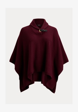 Bordó kötött poncsó magas gallérral, fekete bőrszíjjal és arany csat díszítéssel, laza, folyós kialakítással.