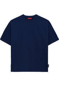 Camiseta de algodón azul marino con cuello redondo, mangas cortas y corte recto. Presenta una pequeña etiqueta en la costura lateral.