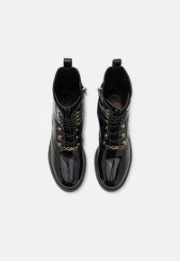 Love Moschino NEW CITY LOVE - Botas de tornozelo com plataforma - nero