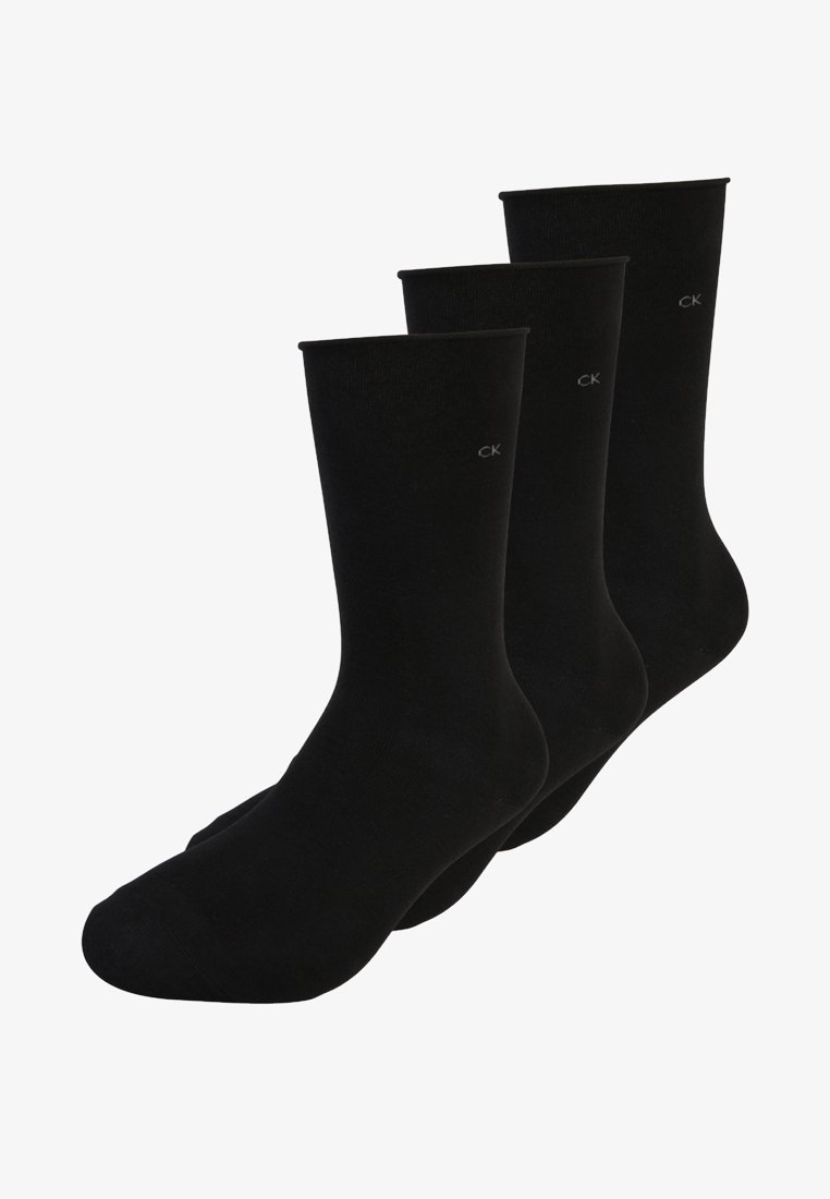 Black crew socks in a pack of three, made from a smooth, stretchy fabric. Each sock features a small, grey CK logo near the top.