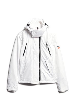 Witte hoodie met twee ritszakken op de borst en twee lagere zijzakken. Kenmerkt zwarte ritsaccenten en een zachte binnenkraag.