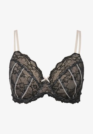 Zwarte kanten beha met beige bandjes, voorzien van florale kanten patronen en decoratieve stiksels. Een klein strikje is centraal tussen de cups geplaatst.