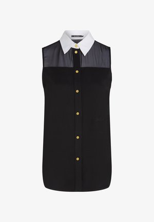 Blusa preta sem mangas com um painel superior transparente preto, colarinho branco e fechos de botão dourados na frente. Textura de tecido suave.