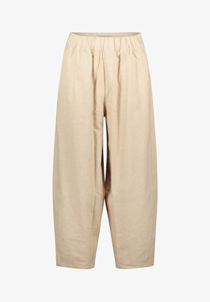 Pantalon ample beige avec une taille élastique et une coupe ample et décontractée, fabriqué dans un tissu léger.