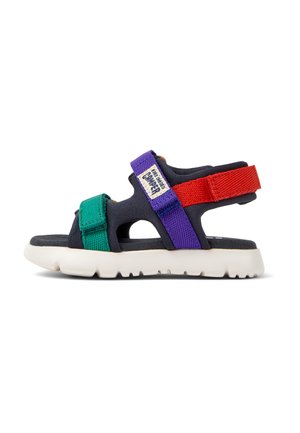 Sandalo per bambini con tomaia in tessuto blu navy, cinturini verdi e viola, dettagli rossi e suola in gomma bianca leggera.