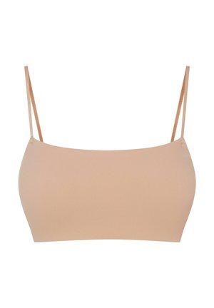 Beige seamless bralette with adjustable thin straps, offering a smooth, stretchy texture and a minimalist design. No padding or underwire.