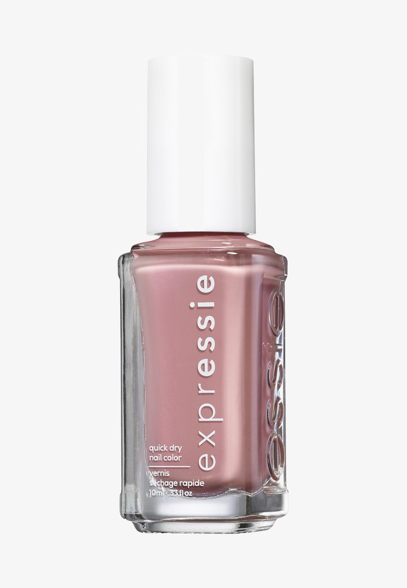 Vernis à ongles rose translucide dans un flacon en verre transparent avec un capuchon blanc, étiqueté "expressie quick dry nail color," 10 mL.