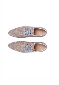 Textured brown shoes with blue floral pattern, pointed toe, white laces, and blue accents. Smooth interior and flat sole design.