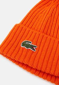 Lacoste UNISEX - Pletena kapa - orange