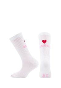 Chaussettes blanches à côtes avec le texte "AMORE" en rose et un cœur rouge de chaque côté. Texture douce avec une forme de chaussette standard et une longueur milieu de mollet.