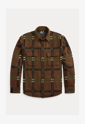 Bruine geruite blouse van zachte stof met twee borstzakken, een knoopsluiting en contrasterende groene, zwarte en crèmewitte strepen.