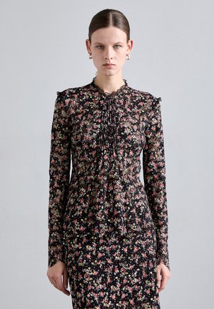 Pikad varrukad must lillene dress, millel on volditud detailid, pitsiga kaelus ja mitmevärvilised väikesed lillemustrid üle kogu.
