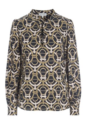 Blouse à manches longues avec un motif géométrique en or, crème et marine. Encolure en clé avec détail bouton, tissu doux et manches froncées.