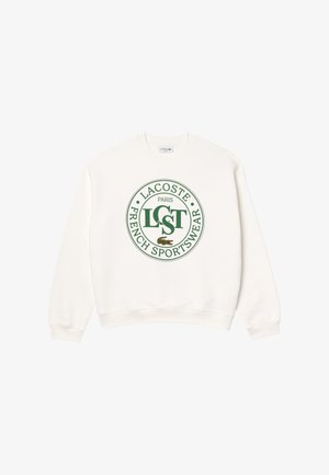 Witte sweatshirt met een ronde groene Lacoste-logo met de tekst "LACOSTE PARIS FRENCH SPORTSWEAR" en een krokodilafbeelding.