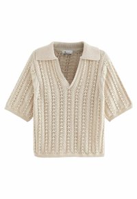 Pull beige en maille avec col en V, manches courtes et motif ajouré texturé, accompagné d'un col contrastant. Matière douce et légère.