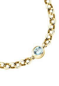 Bracciale in oro con maglie lisce e arrotondate, arricchito da una pietra azzurra incastonata a filo come elemento decorativo principale.