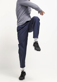 Nike Performance Kalhoty - blue
