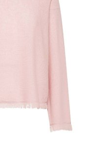 Maglione rosa a maniche lunghe con una morbida texture a maglia e orli sfilacciati sul fondo e sui polsini.