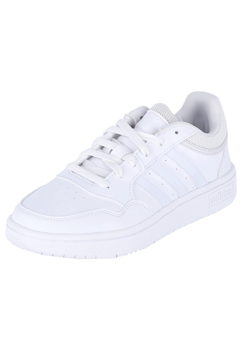 White athletic shoe with a smooth leather upper, round toe, textured upper with three side stripes, and a rubber outsole.
