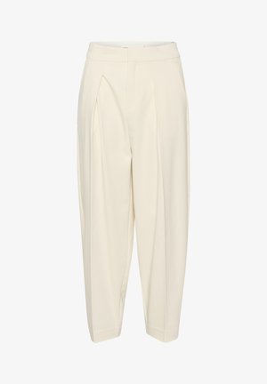 Krēmkrāsas piegrieztas bikses ar augstu jostasvietu, sūkņotu priekšpusi un sašaurinātām kājām. Izgatavotas no gludas auduma bez rakstiem vai rotājumiem.