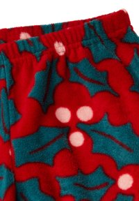 Tela de forro polar roja con hojas de acebo verdes y bayas rosas, con cintura elástica para mayor comodidad y textura suave.