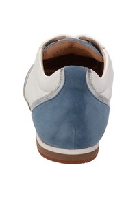 White and blue sneaker with a suede heel, leather upper, silver accents, and a rubber sole. Features distinctive stitching details.