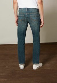 Next MOTION FLEX STRETCH - Vaqueros slim fit - vintage blue tint