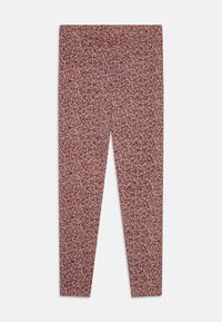 Blomstrete leggings med rosa bunn og små røde og blå blomster. Laget av elastisk stoff, designet med en slim fit.