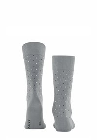 Grau gestreifte Socken mit einer mittleren Rippstruktur, die ein Muster aus kleinen schwarz-weißen Punkten aufweisen, und eine verstärkte Spitze für Haltbarkeit.