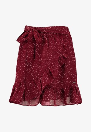 Bordeaux farvet omslagsskjørt med hvide polkaprikker, flæsekant og bindebånd i taljen.