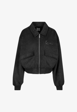 Black cropped jacket in faux suede, featuring a front zipper, two large front pockets, ribbed cuffs, and a signature logo on the chest.