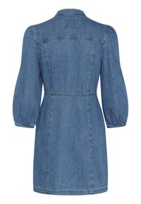 Denim dress in light blue, featuring a collared neckline, puffed sleeves, a fitted waist, and a flared skirt. Smooth texture and classic design.