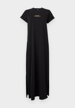 Black maxi t-shirt dress made of soft fabric, featuring a crew neck, short sleeves, and side slits. Gold embroidered text on the front.