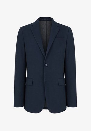 Granatowa marynarka wykonana z teksturowanej tkaniny. Posiada klapę w sposób klasyczny, dwie przednie kieszenie, zapięcie na pojedynczy guzik oraz jedną kieszeń na piersi.