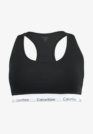 Sutiã desportivo preto com um design de costas de nadador, feito de um tecido elástico. Apresenta uma faixa branca com a marca "Calvin Klein" na parte inferior.