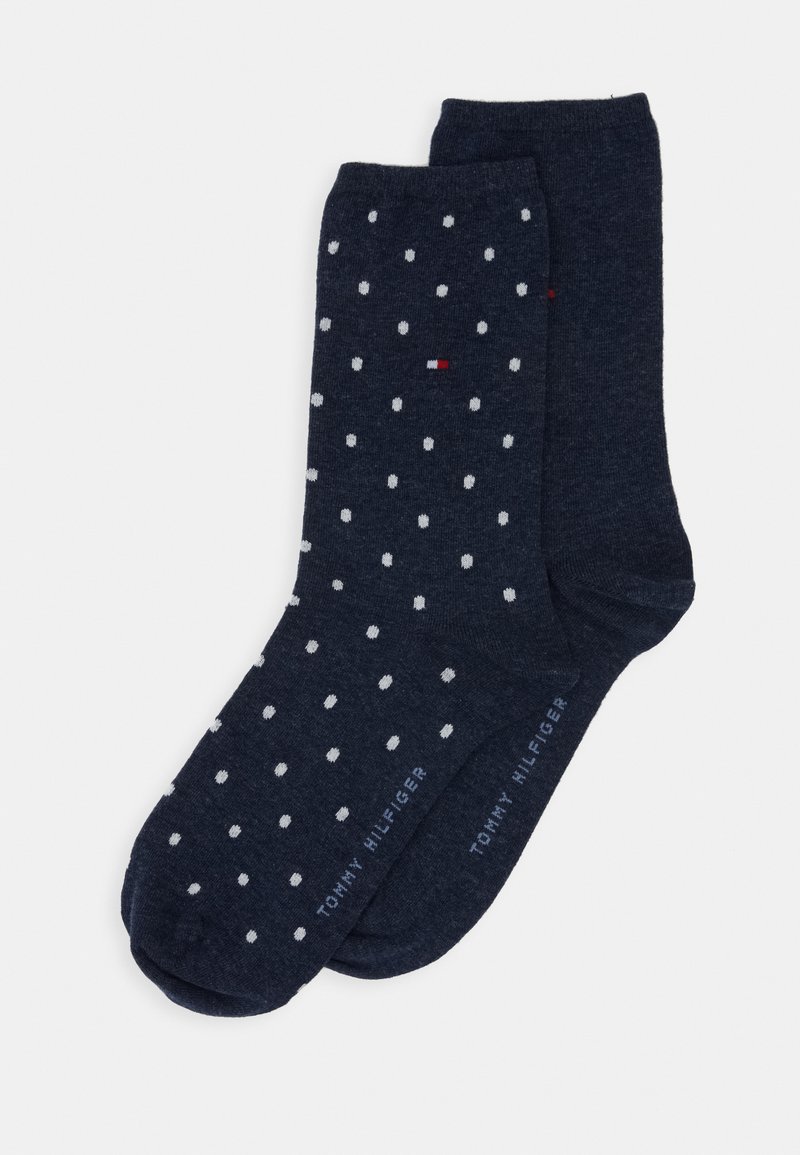 Marina strumpor med vita prickar, blandmaterial av bomull, ribbat manschett och "TOMMY HILFIGER"-logotyp tryckt nära tårna.
