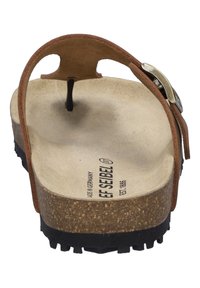 Ruske nahk sandals, der har en kork sål, sort gummisåle og en justerbar rem med metal detaljer for en sikker pasform.