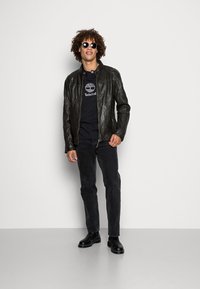 Gipsy by Mauritius CHUTO  - Casaco de couro - dark olive