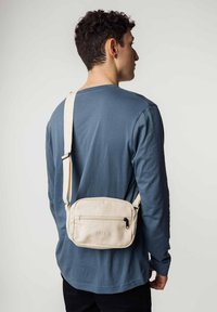 MELA KLEINE PATNI - Umhängetasche - ecru