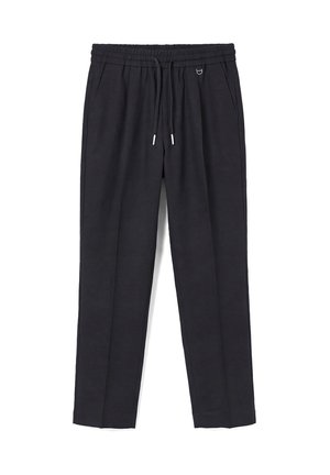Pantalon décontracté noir avec taille élastique, cordon de serrage, poches latérales et coupe droite, posé à plat sur fond blanc.