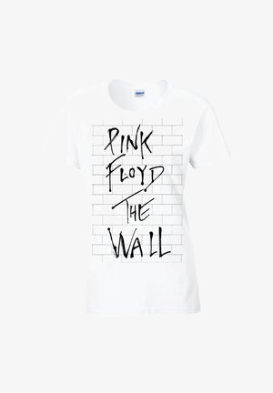 T-shirt en coton blanc avec un imprimé de style graffiti noir portant le texte "PINK FLOYD THE WALL" sur un motif de mur de briques.