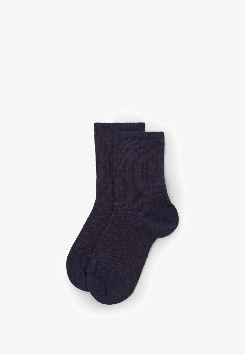 Calze blu marine realizzate in tessuto a maglia, con un motivo di piccole macchie rosse. Design alla caviglia con polsini a coste e punte rinforzate.