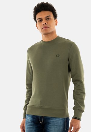 Sudadera verde aceituna con puños y dobladillo acanalados. Presenta un pequeño logo bordado en el pecho. Fabricada con un tejido suave y texturizado.