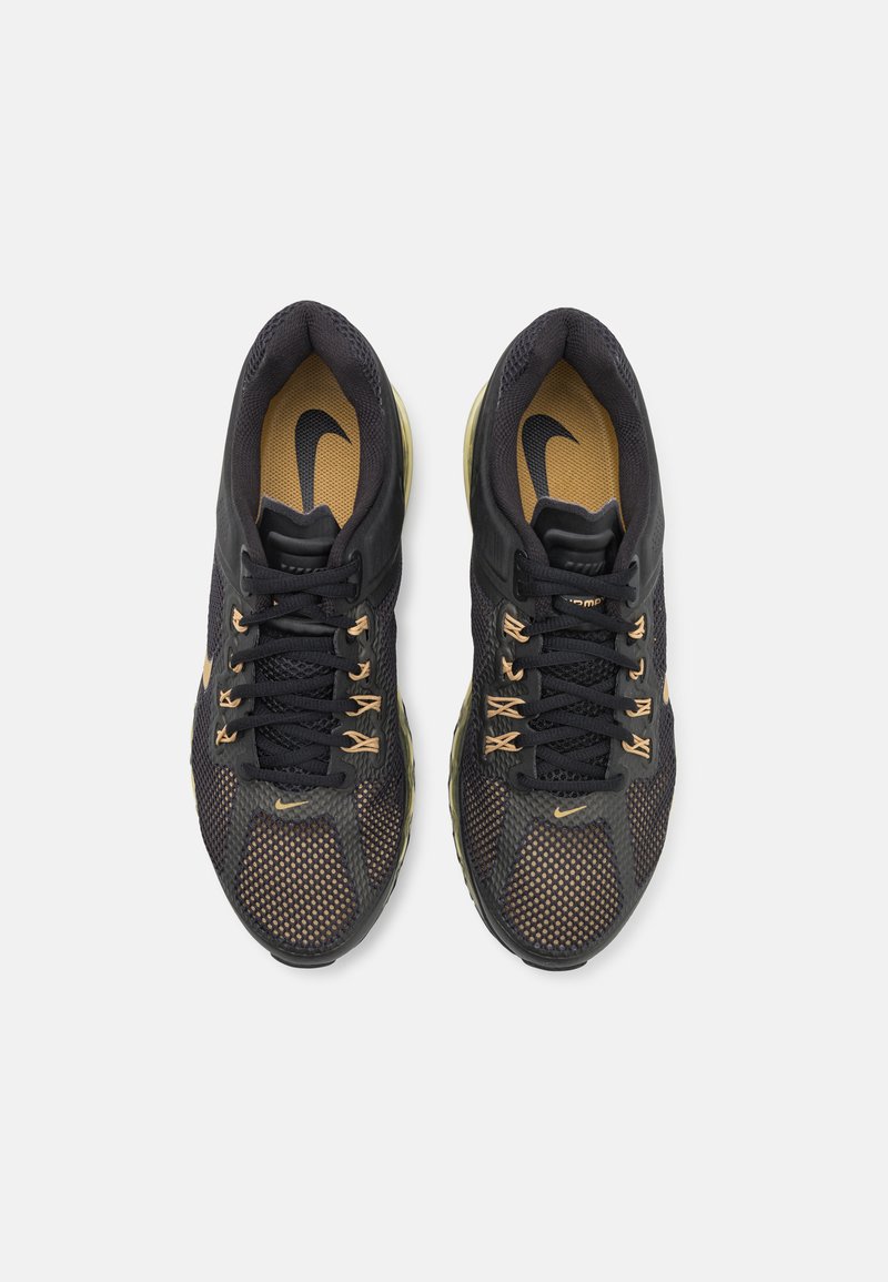 Nike Black and Gold Athletic Shoes with Textured Upper Nike Performance FLEX RUNNER 4 UNISEX - Road running shoes  main image 4