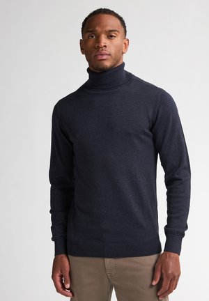 Maglione a collo alto navy in morbido tessuto a maglia, con maniche lunghe e polsini e orlo a costine. Texture liscia con una silhouette aderente.