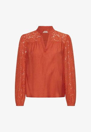 Orangenes Oberteil mit Spitzenmuster an den langen Ärmeln, einem V-Ausschnitt und einem gerafften Einsatz. Der Stoff wirkt leicht und strukturiert.